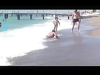 Bodybuilder Show-Off at the Beach