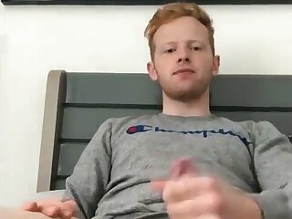 Ginger lad wanks his cock
